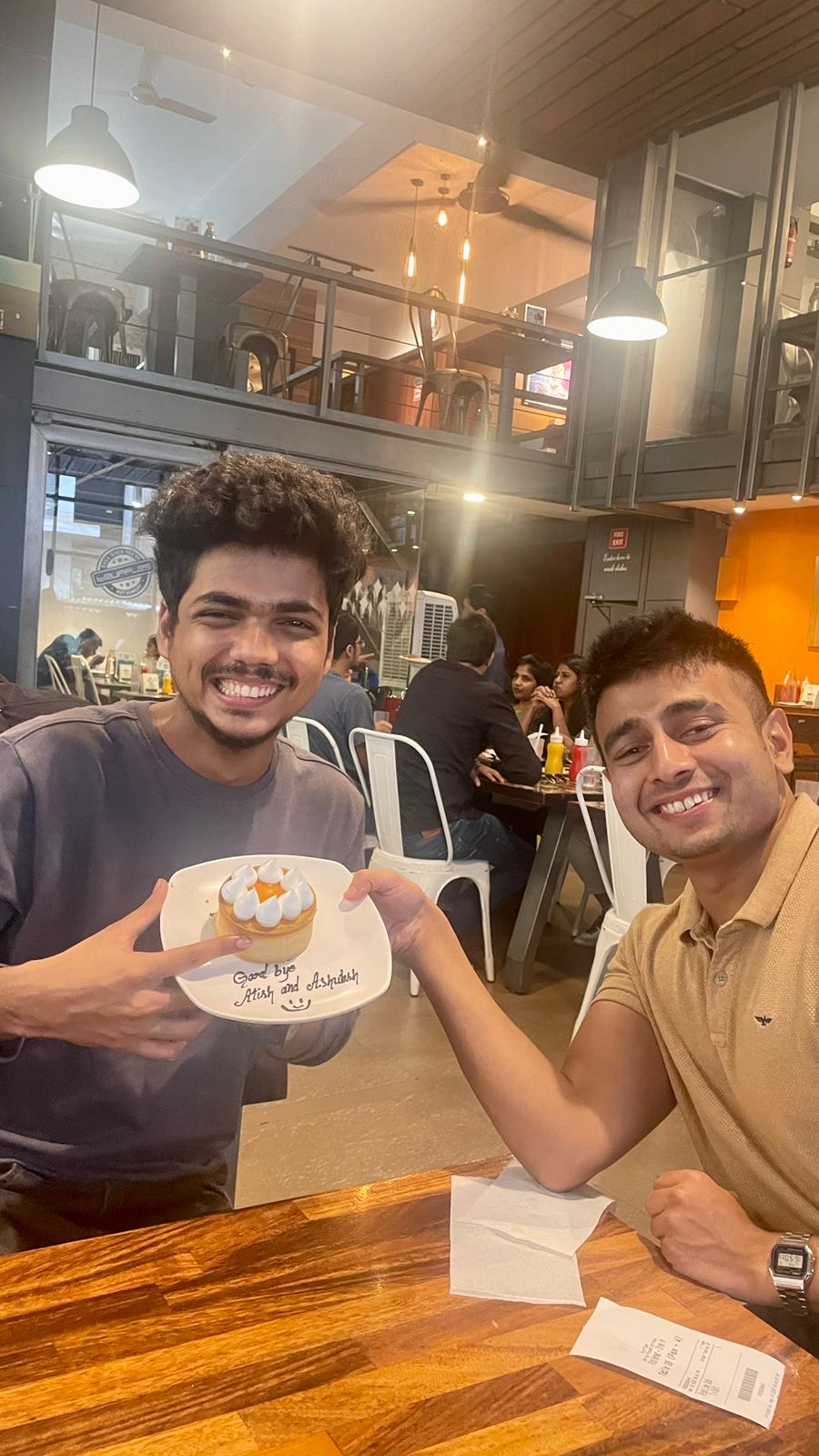 Atish and I holding the Goodbye Pastry Plate